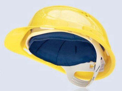 Das Bild zeigt einen gelben Schutzhelm leicht von unten, so dass ein schwarzes Inlay im Helm zu sehen ist, das den Kopf rundum kühlt. Link zur vergrößerten Darstellung des Bildes.