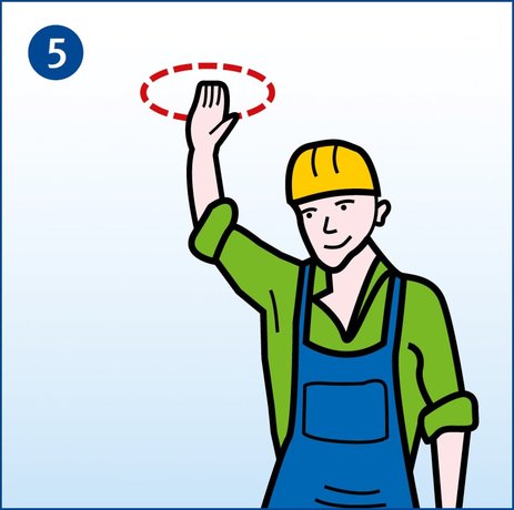 Zu sehen ist ein Arbeiter, der seinen rechten Arm nach oben hält und über dem Kopf mit der Hand eine kreisende Bewegung ausführt. Das ist das Handzeichen bei Kranarbeiten für „Heben, auf“. Link zur vergrößerten Darstellung des Bildes.