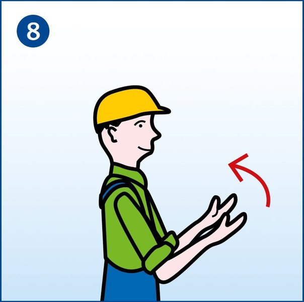 Zu sehen ist ein Arbeiter, der beide Arme mit den Handflächen nach oben vor dem Bauch angewinkelt hat und zu sich hinbewegt. Das ist das Handzeichen bei Kranarbeiten für „Heranfahren“.