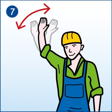 Zu sehen ist ein Arbeiter, der seinen rechten Arm nach oben hält und über Kopf hin- und herbewegt. Das ist das Handzeichen bei Kranarbeiten für „Abfahren“. Link zur vergrößerten Darstellung des Bildes.